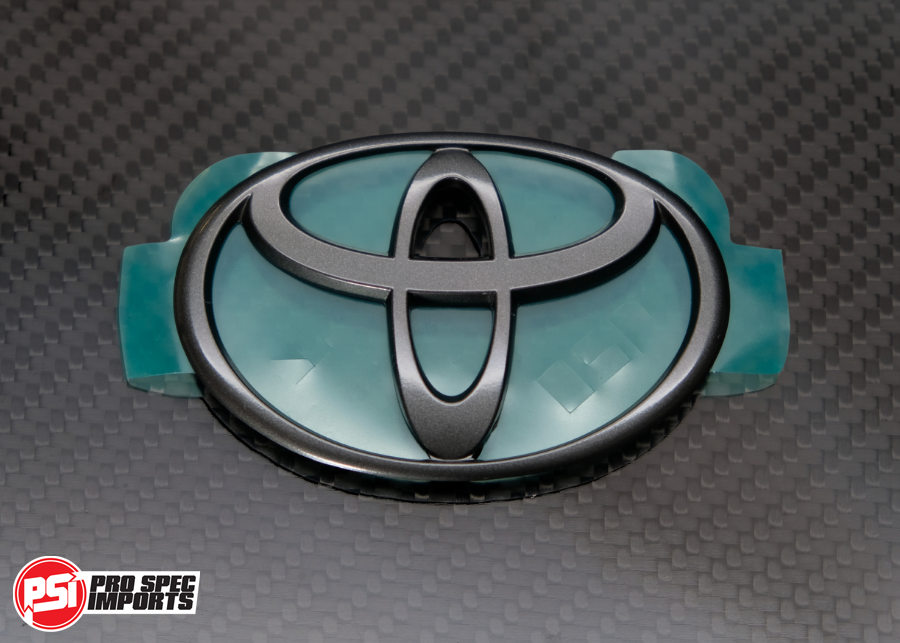 Genuine Toyota OEM JZA80 MKIV Supra Rear Hatch Badge Emblem | P/N 75471-14010