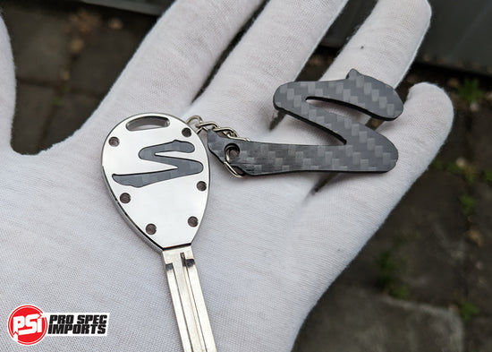 Load image into Gallery viewer, Carbon Fibre Supra &amp;#39;S&amp;#39; logo Supra Keychain
