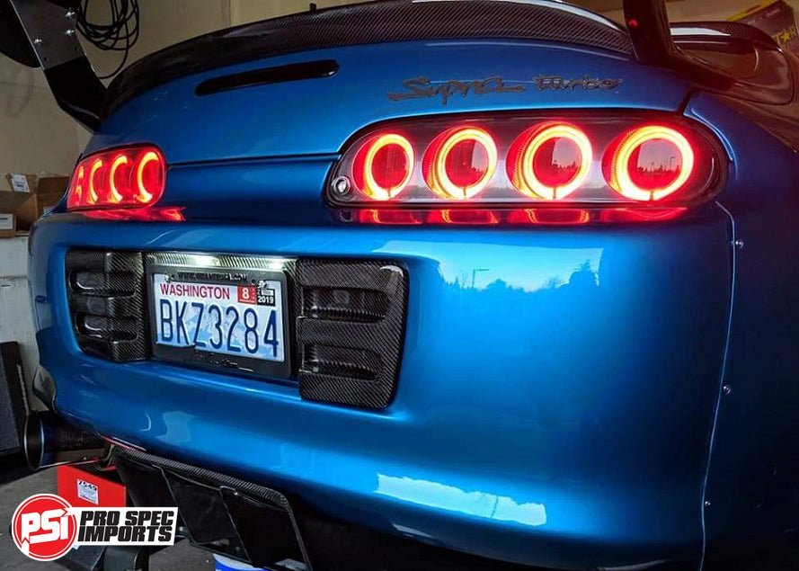 A80 (MK4) Supra - Carbon Fibre Rear Number Plate Garnishes - Pro Spec Imports - 3K Twill Weave Carbon Fibre - 